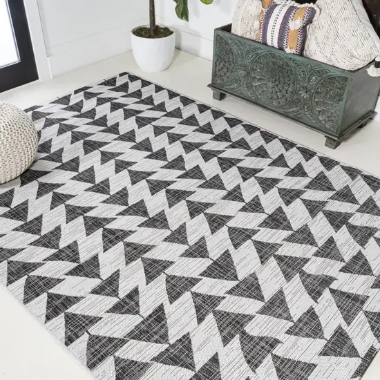 Ivory And Black Geometric Indoor Outdoor Area Rug Photo 7