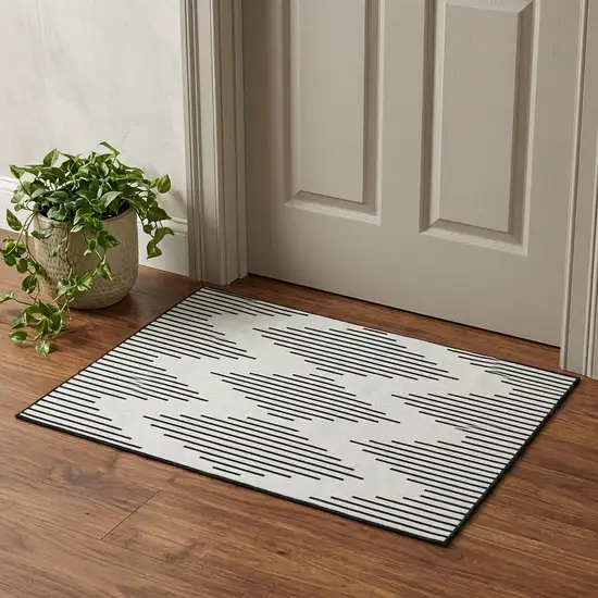 Ivory And Black Geometric Washable Area Rug With UV Protection Photo 1