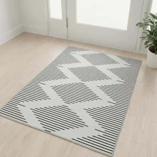 Ivory And Black Geometric Washable Area Rug With UV Protection Photo 2