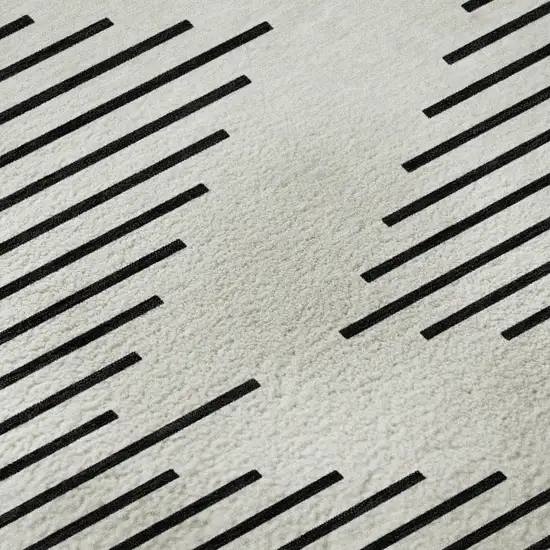 Ivory And Black Geometric Washable Area Rug With UV Protection Photo 8
