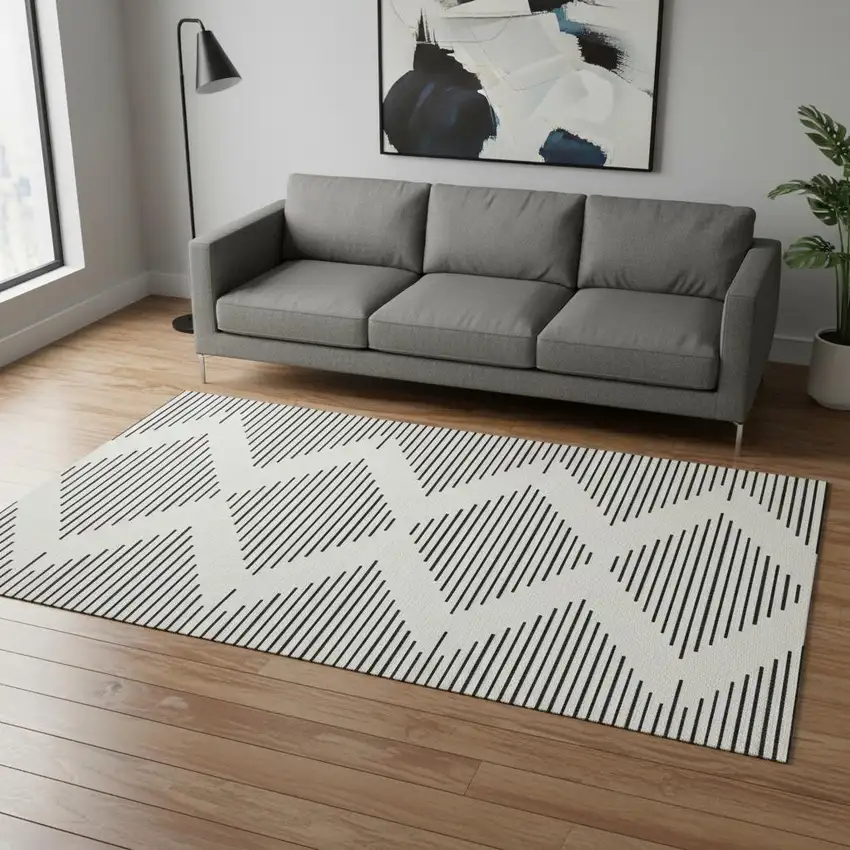 Ivory And Black Geometric Washable Area Rug With UV Protection Photo 2