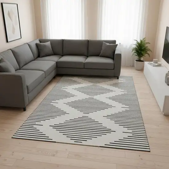 Ivory And Black Geometric Washable Area Rug With UV Protection Photo 2