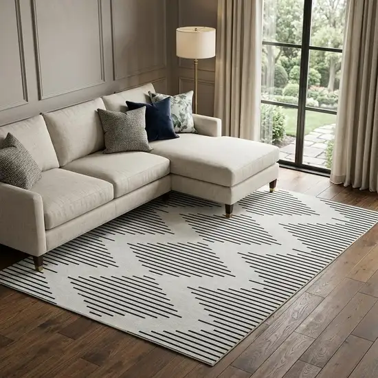 Ivory And Black Geometric Washable Area Rug With UV Protection Photo 1