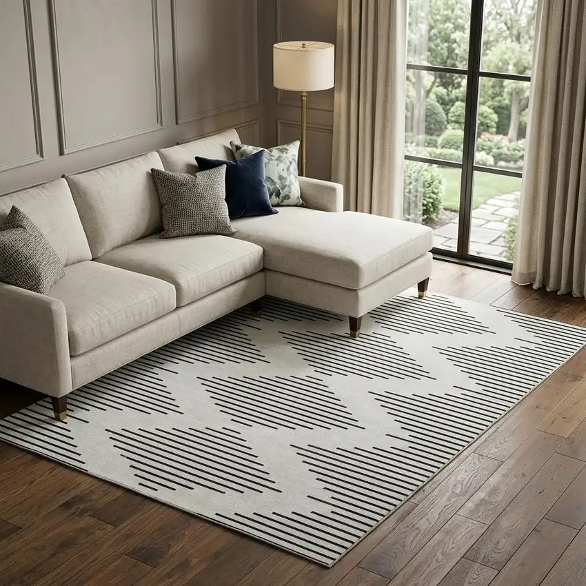 Ivory And Black Geometric Washable Area Rug With UV Protection Photo 1