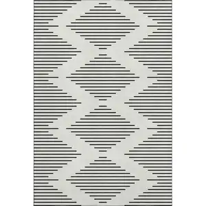 Photo of Ivory And Black Geometric Washable Area Rug With UV Protection