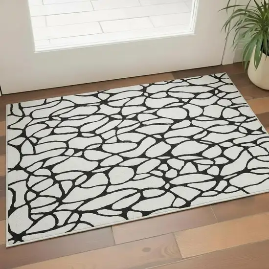 Ivory And Black Geometric Washable Area Rug With UV Protection Photo 2