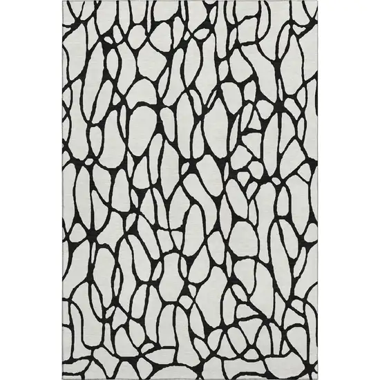 Ivory And Black Geometric Washable Area Rug With UV Protection Photo 1