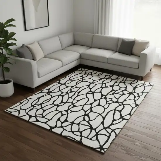 Ivory And Black Geometric Washable Area Rug With UV Protection Photo 2
