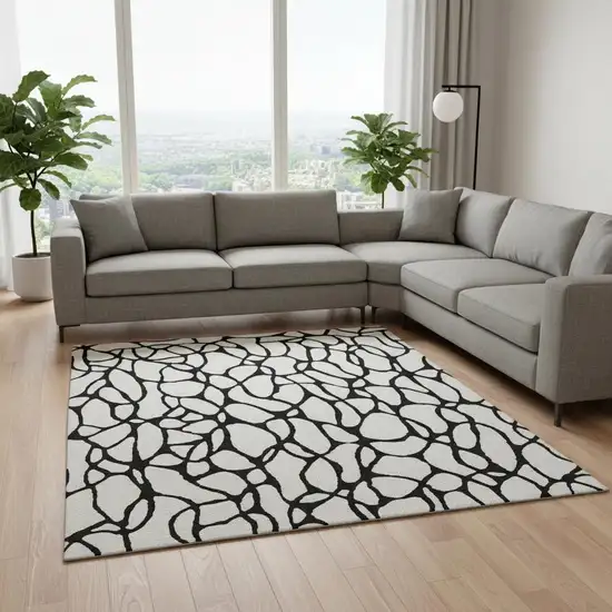 Ivory And Black Geometric Washable Area Rug With UV Protection Photo 2