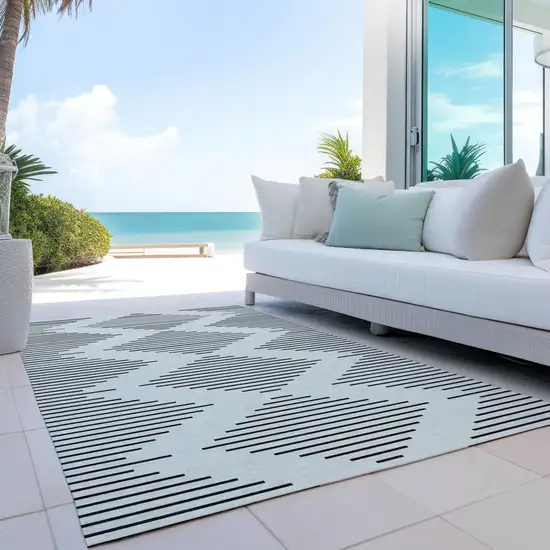 Ivory And Black Geometric Washable Indoor Outdoor Area Rug Photo 8