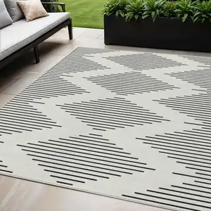 Photo of Ivory And Black Geometric Washable Indoor Outdoor Area Rug