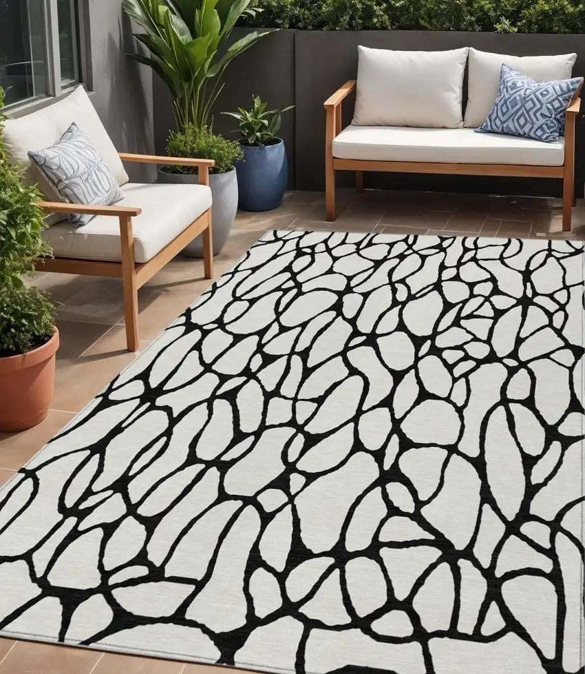 Ivory And Black Geometric Washable Indoor Outdoor Area Rug Photo 1
