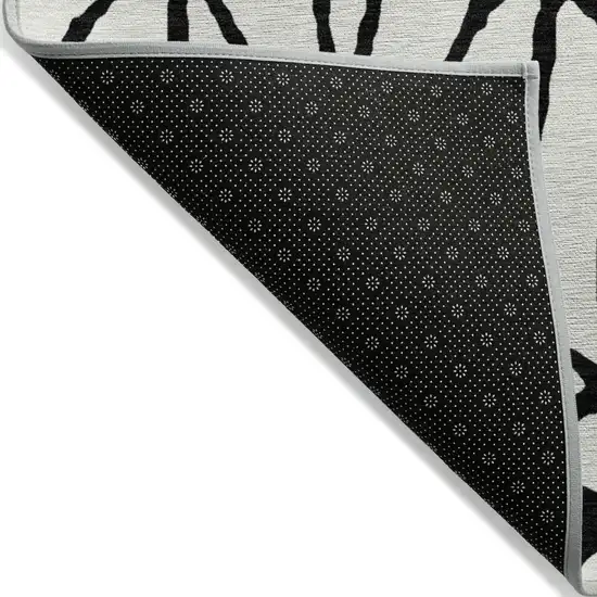 Ivory And Black Geometric Washable Indoor Outdoor Area Rug Photo 4