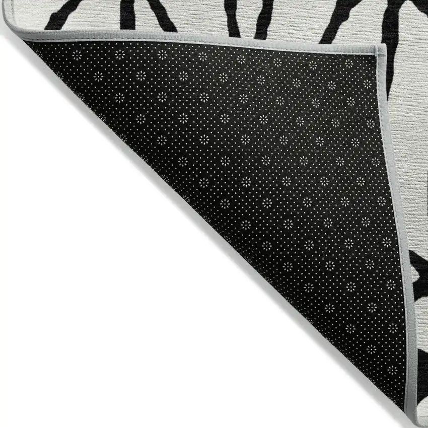 Ivory And Black Geometric Washable Indoor Outdoor Area Rug Photo 4