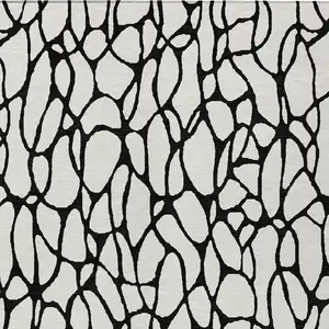 Photo of Ivory And Black Geometric Washable Indoor Outdoor Area Rug