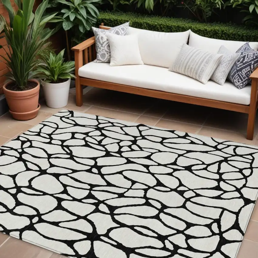 Ivory And Black Geometric Washable Indoor Outdoor Area Rug Photo 1