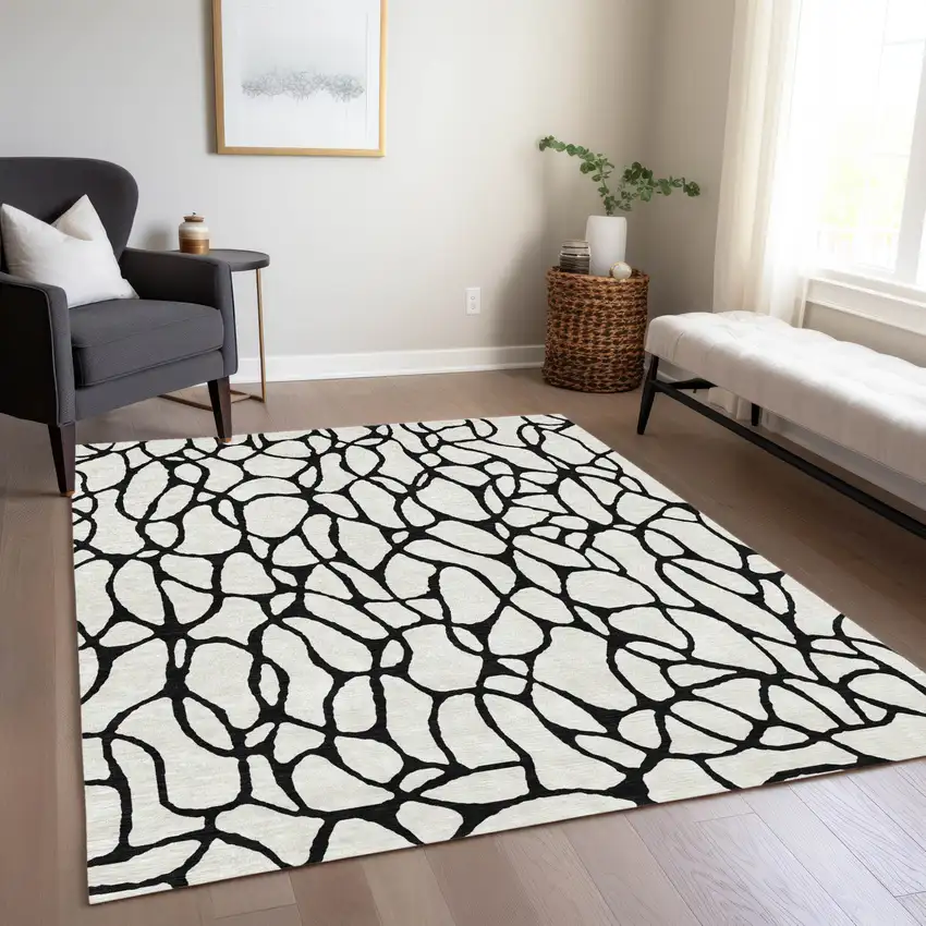 Ivory And Black Geometric Washable Indoor Outdoor Area Rug Photo 9
