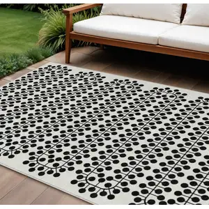 Photo of Ivory And Black Geometric Washable Indoor Outdoor Area Rug