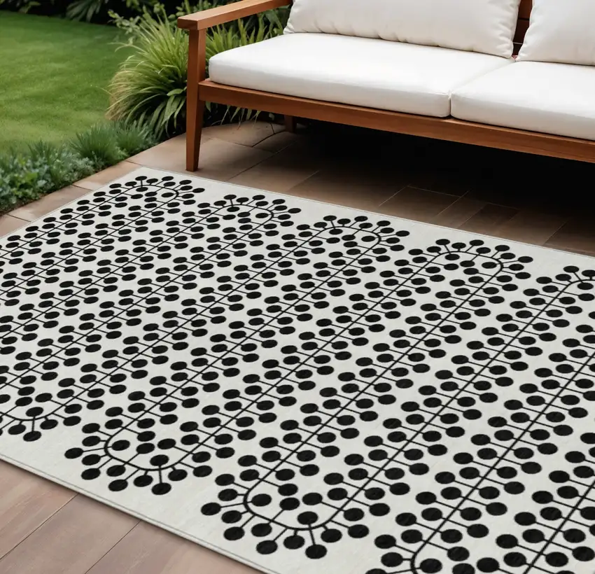 Ivory And Black Geometric Washable Indoor Outdoor Area Rug Photo 1
