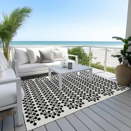 Ivory And Black Geometric Washable Indoor Outdoor Area Rug Photo 9