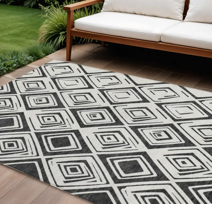 Ivory And Black Geometric Washable Indoor Outdoor Area Rug Photo 1