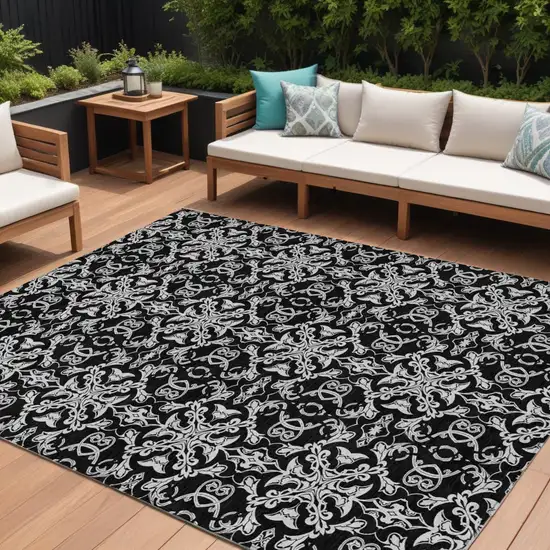 Ivory And Black Medallion Washable Indoor Outdoor Area Rug Photo 1
