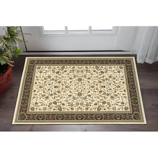 2' X 4' Ivory And Black Oriental Power Loom Stain Resistant Area Rug Photo 1
