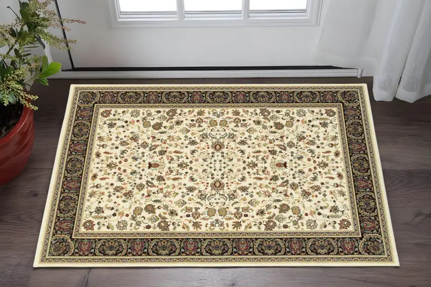 2' X 4' Ivory And Black Oriental Power Loom Stain Resistant Area Rug Photo 1