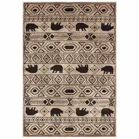 Photo of Ivory And Black Southwestern Power Loom Stain Resistant Area Rug