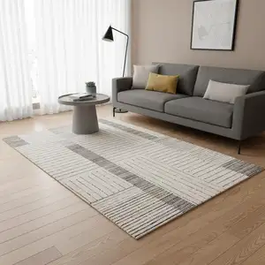 Photo of Ivory And Black Striped Area Rug
