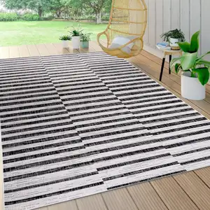 Photo of Ivory And Black Striped Indoor Outdoor Area Rug