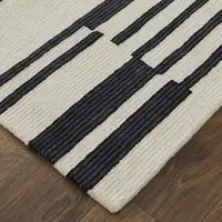 Photo of Ivory And Black Wool Abstract Tufted Handmade Area Rug