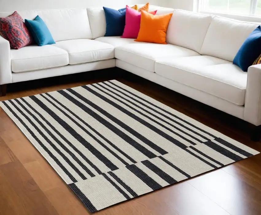 Ivory and Black Wool Abstract Hand Tufted Area Rug Photo 1