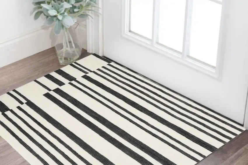 Ivory and Black Wool Abstract Hand Tufted Area Rug Photo 1