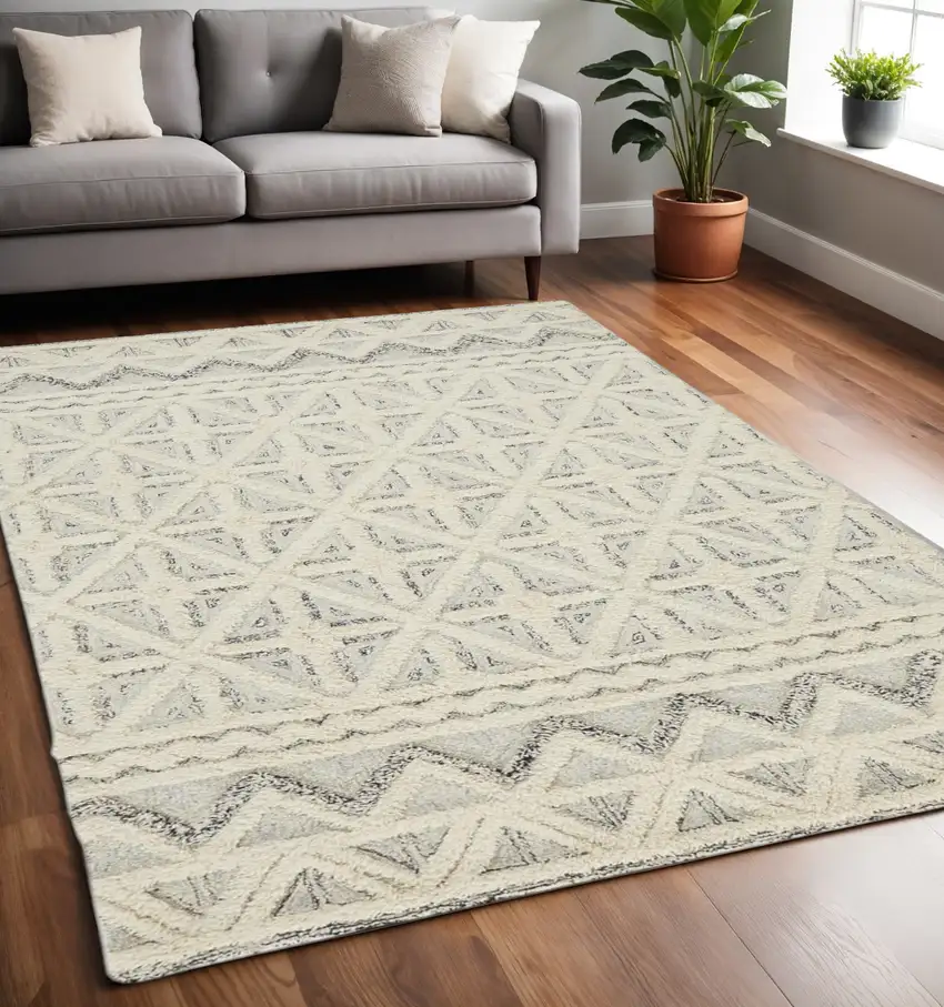 Ivory And Black Wool Geometric Tufted Handmade Stain Resistant Area Rug Photo 1