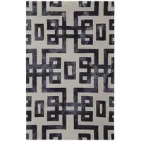 Photo of Ivory And Black Wool Tufted Handmade Area Rug