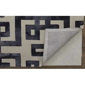 Photo of Ivory And Black Wool Tufted Handmade Area Rug