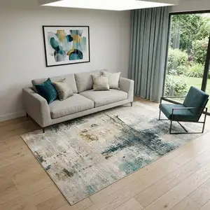 Photo of Ivory And Blue Abstract Area Rug