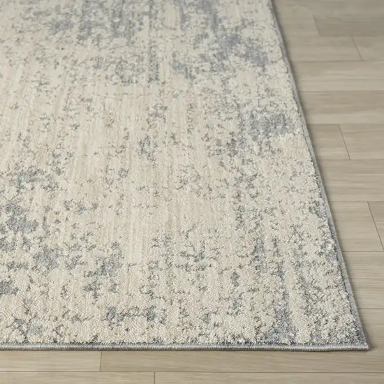 Ivory And Blue Abstract Area Rug Photo 3