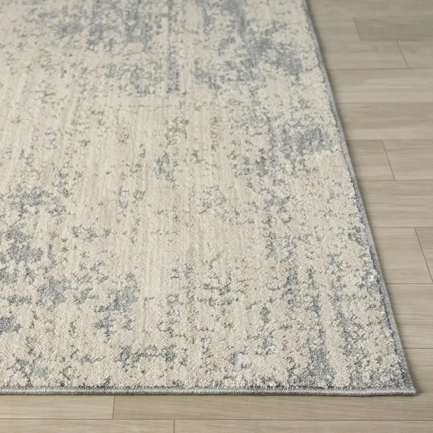 Ivory And Blue Abstract Area Rug Photo 3