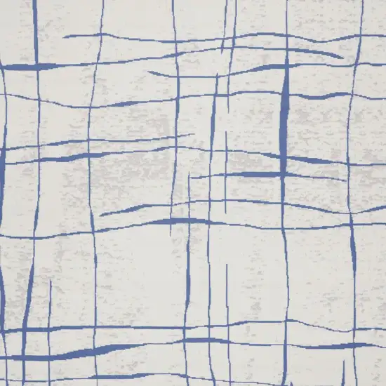 Ivory And Blue Abstract Distressed Area Rug Photo 6