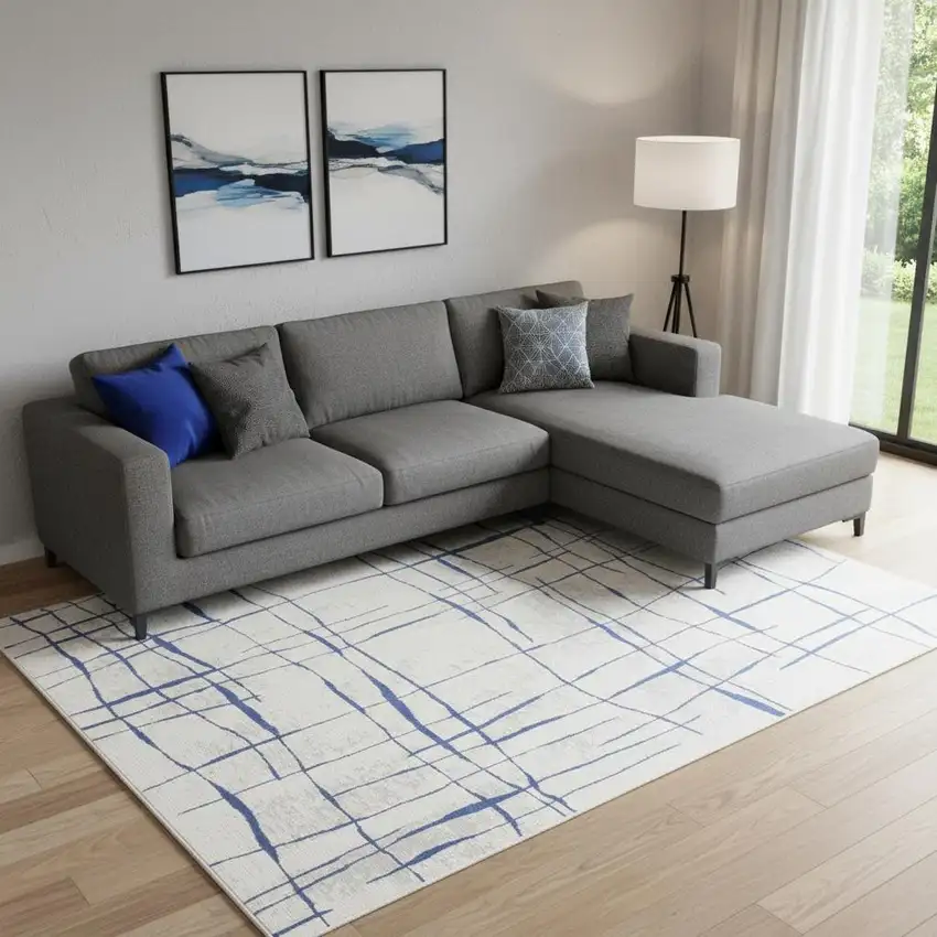 Ivory And Blue Abstract Distressed Area Rug Photo 1