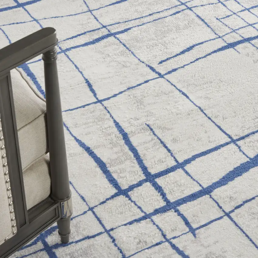 Ivory And Blue Abstract Distressed Area Rug Photo 9