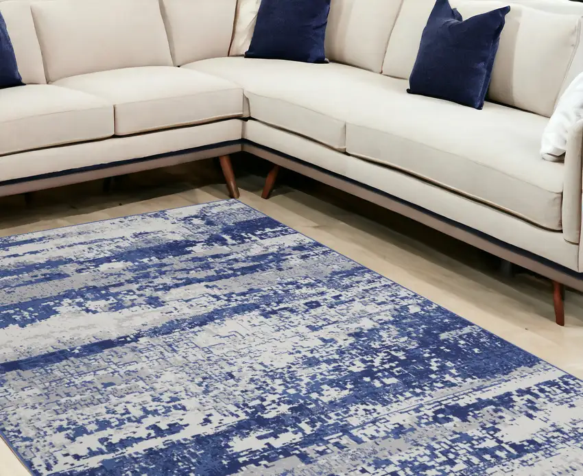 Ivory And Blue Abstract Distressed Area Rug Photo 1