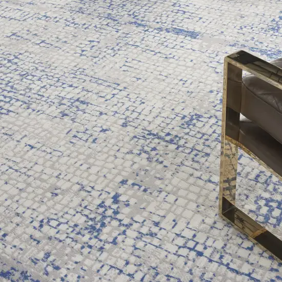 Ivory And Blue Abstract Distressed Area Rug Photo 9
