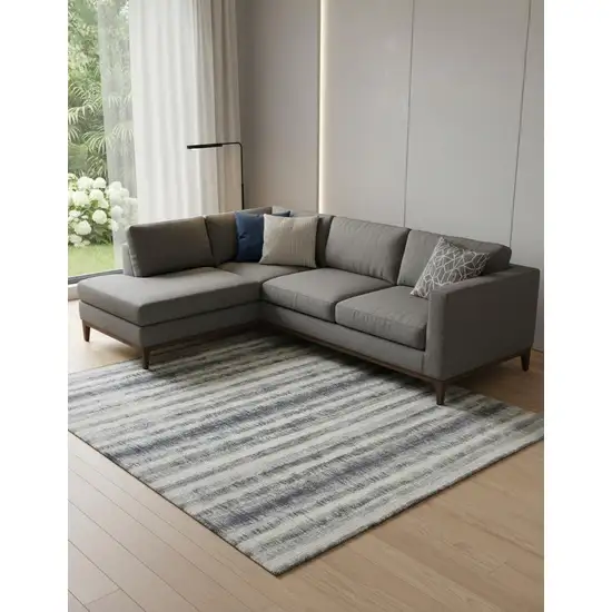 Ivory And Blue Abstract Hand Woven Area Rug Photo 1