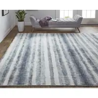 Photo of Ivory And Blue Abstract Hand Woven Area Rug