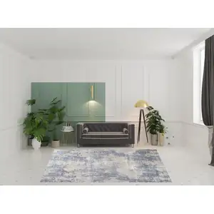 Photo of Ivory And Blue Abstract Non Skid Area Rug