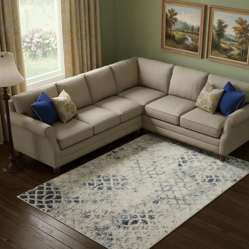 Ivory And Blue Abstract Power Loom Distressed Area Rug Photo 1