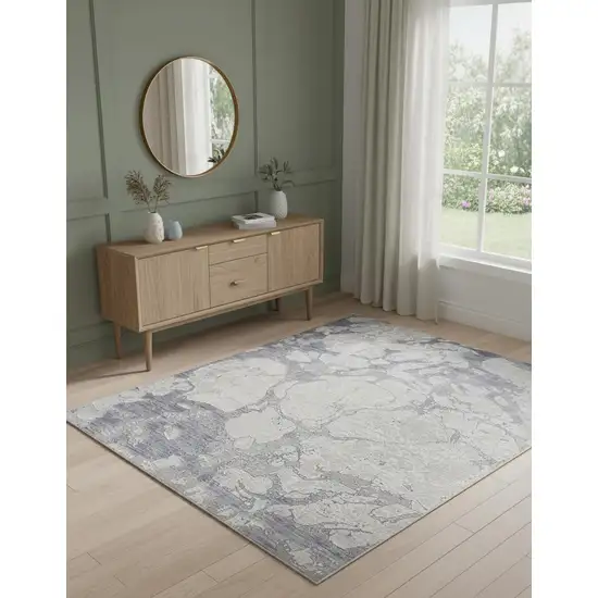 Ivory And Blue Abstract Power Loom Distressed Area Rug Photo 1